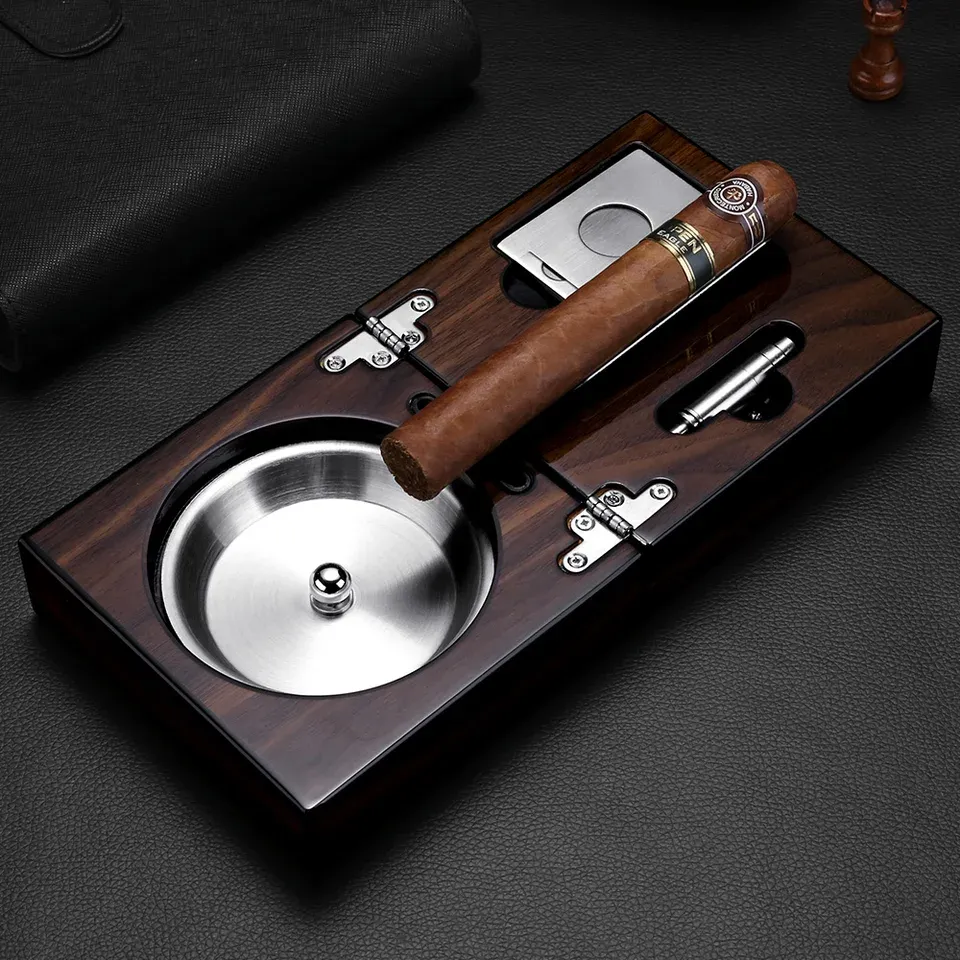 A dark walnut cigar ashtray with a stainless dish and cutter drawer