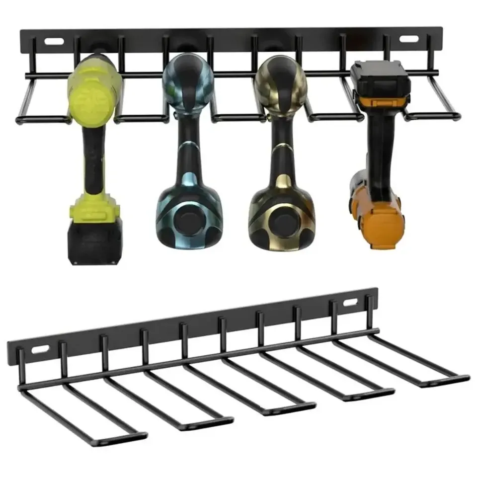 A wall-mounted steel rack holding four cordless drills