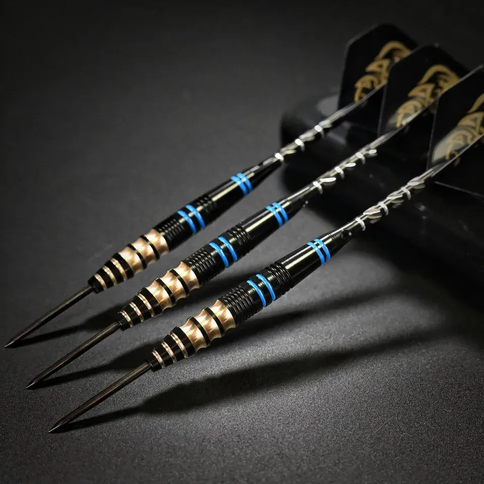 A set of black and gold tungsten steel-tip darts